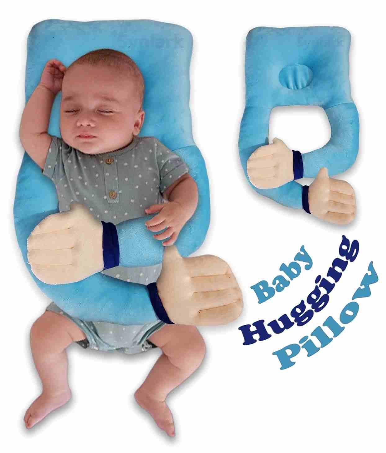 Baby hugging pillow with a baby lying on it, showing the product's design and use.